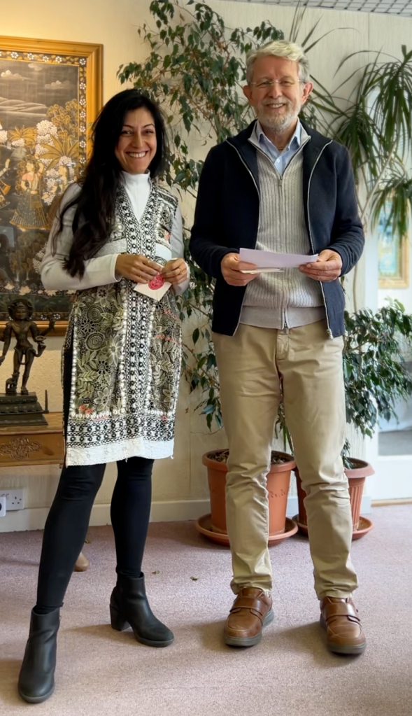 Natasha Chawla receiving the 2023 Tagore Centre UK bursary. 